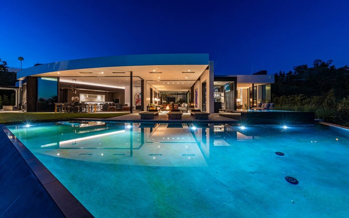 swimming pool nightime beverly hills luxury home