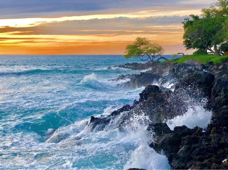 Crashing waves at Mauna Kea Resort in hawaii
