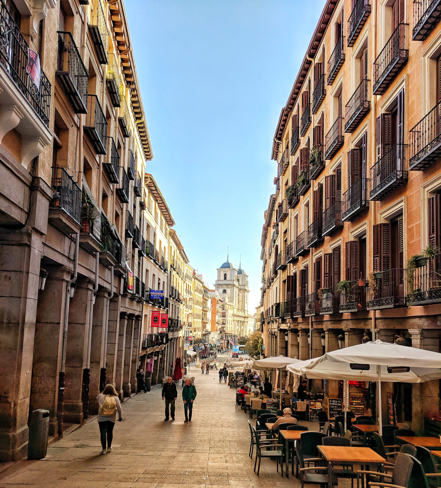 street in old mardrid with shops and buildings