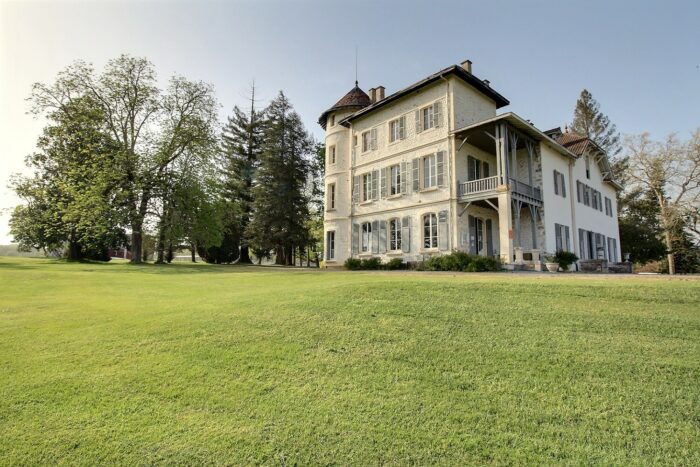 outside exterior of a 19th century castle and golf course estate in south west france