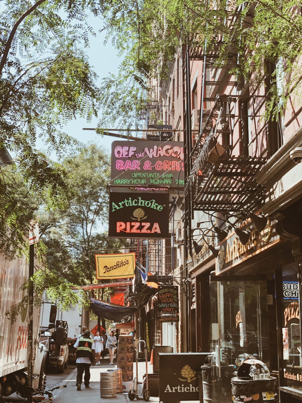 greenwich village street with restaraunts and shops