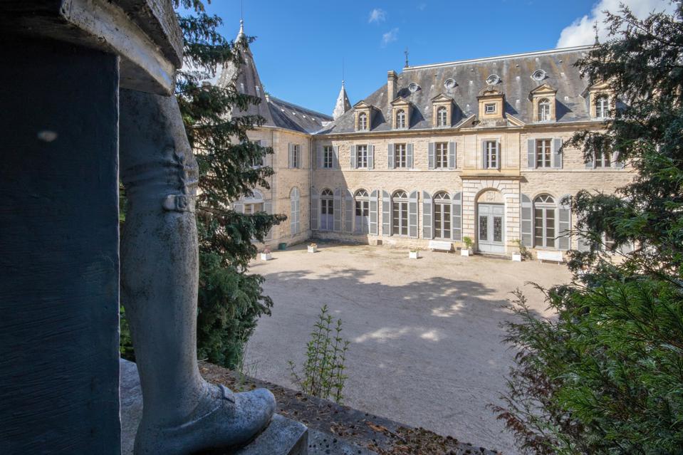 sand colored castle in auvergne rhone alpes region of france