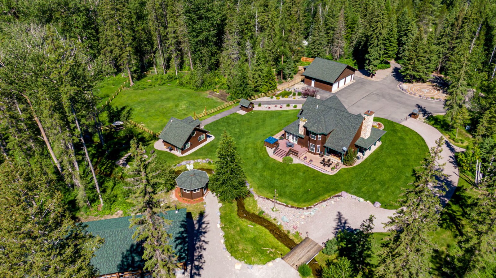 aerial view of montanta ranch with multiple home and yurts
