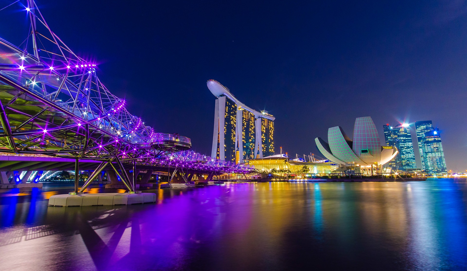 the singapore skyline and neon lights at night