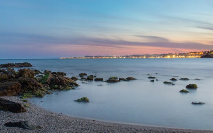 ocean meets sand in costa del sol spain