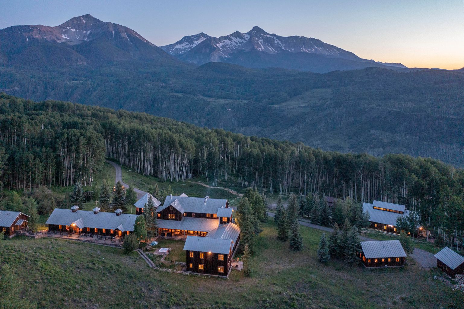 aerial view of a luxury telluride compound made of old barns at 8121 preserve drive