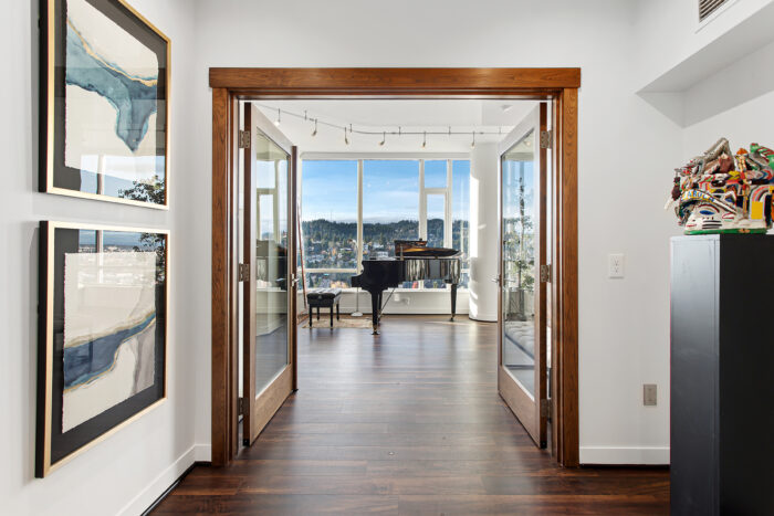 French doors leading to piano room in Portland penthouse. 