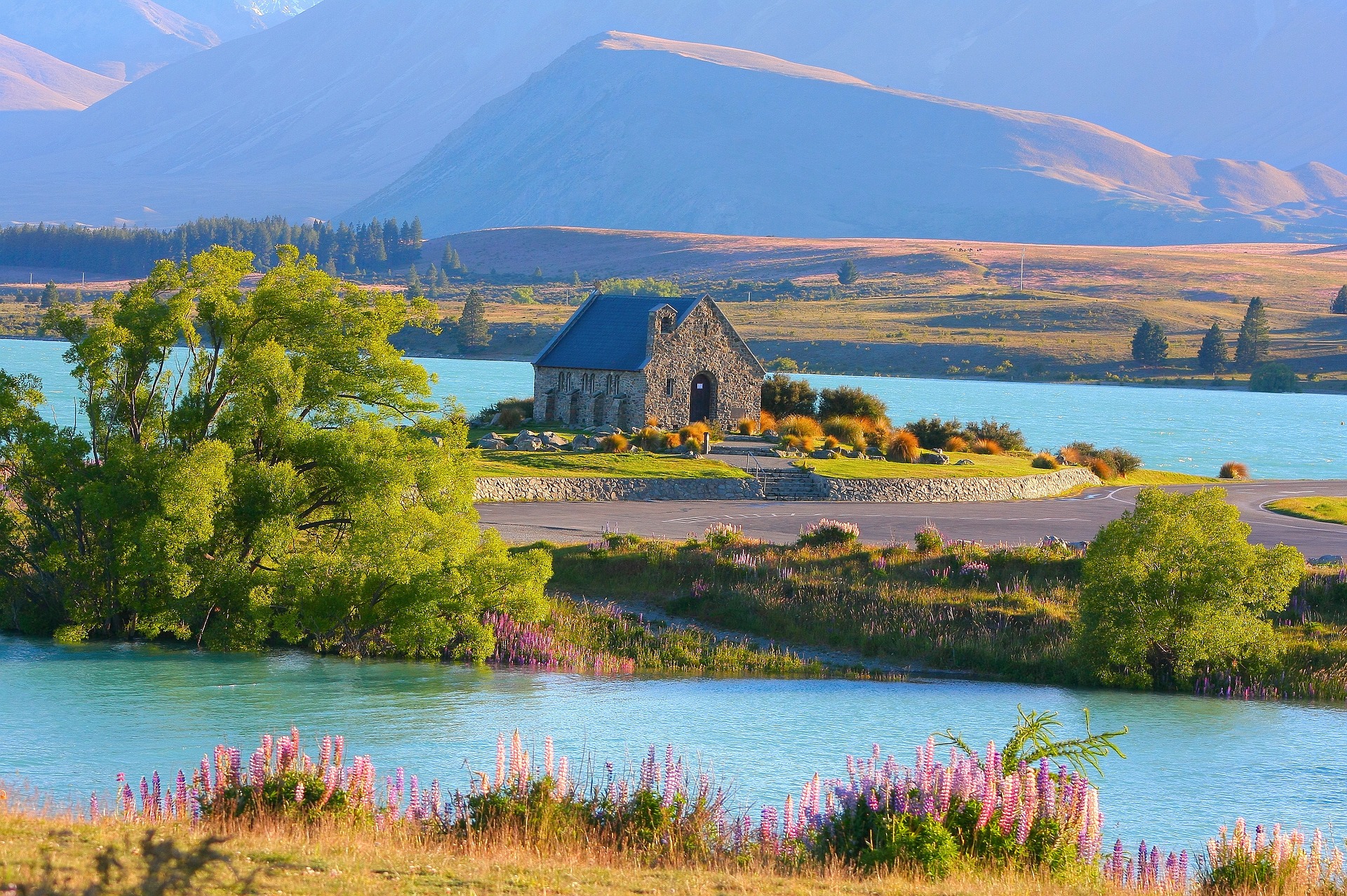 view of a charming stone house on lake tekapo in new zealand