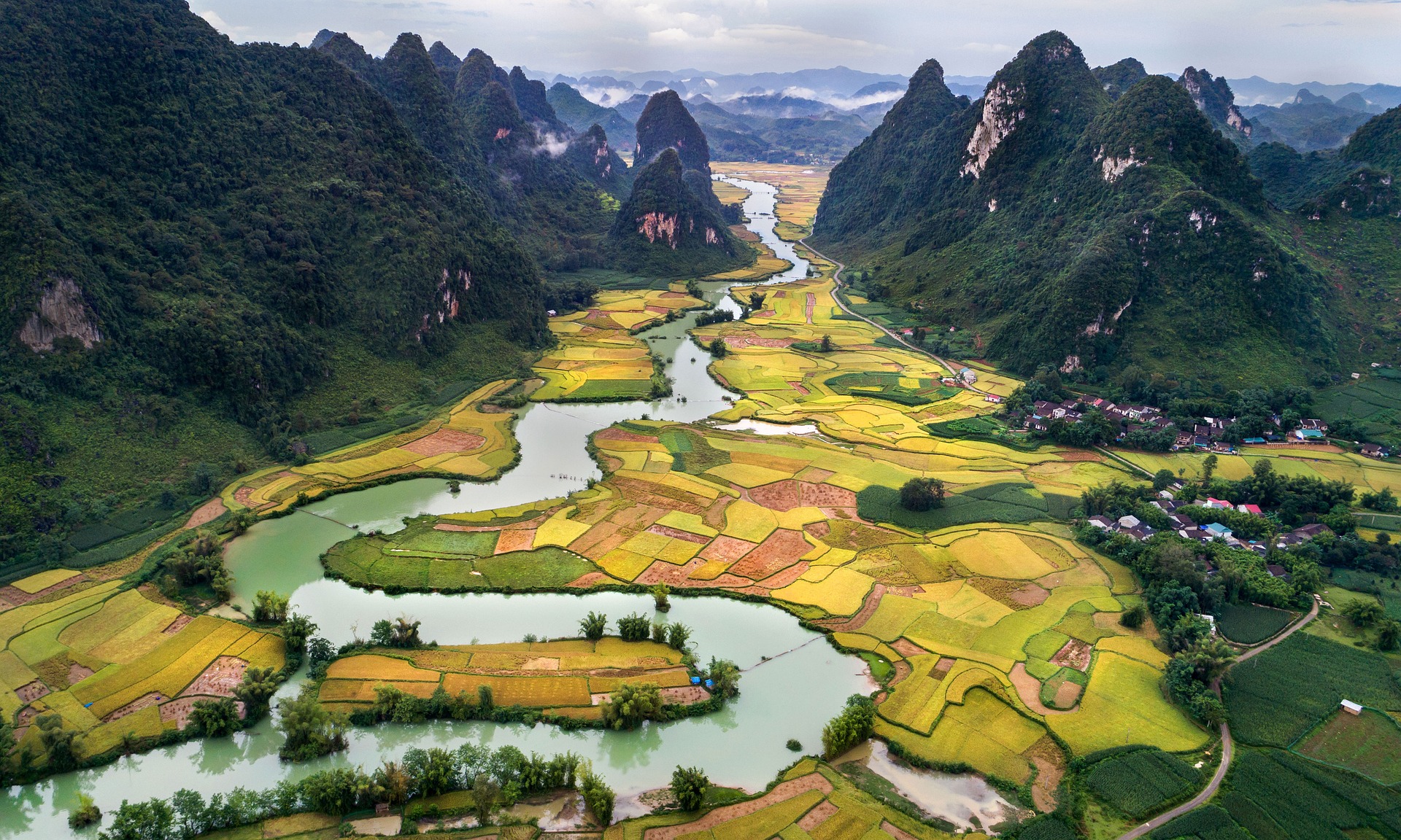 vietnam countryside with snaking river through mountains