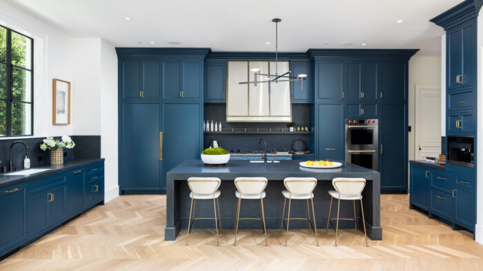 luxury california kitchen with blue-hued cabinetry and island