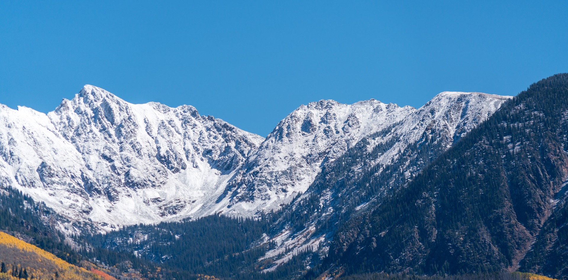 snow covered mountain vistas of the rocky mountains in colorado