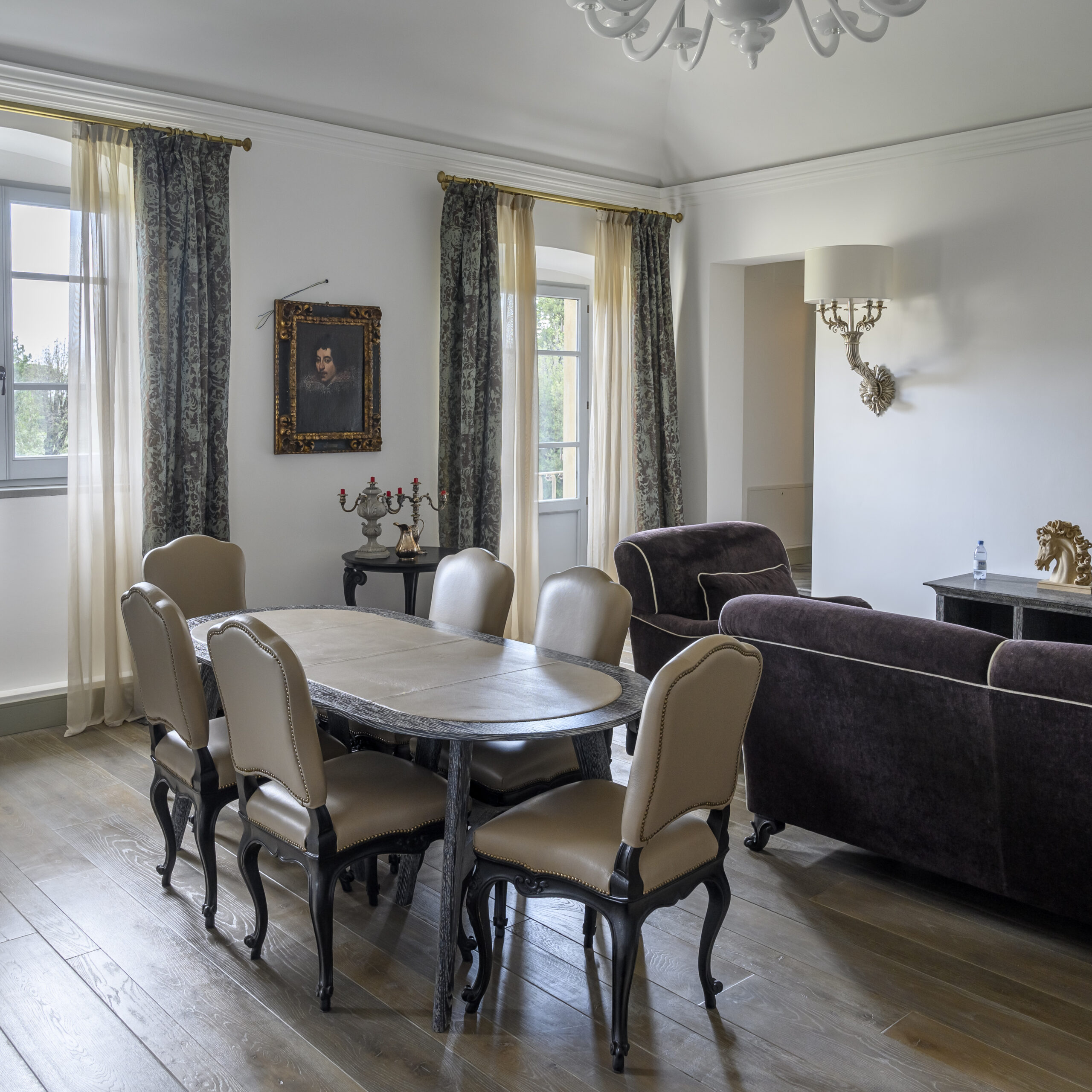 Dining area and family room in restored Florence villa. 