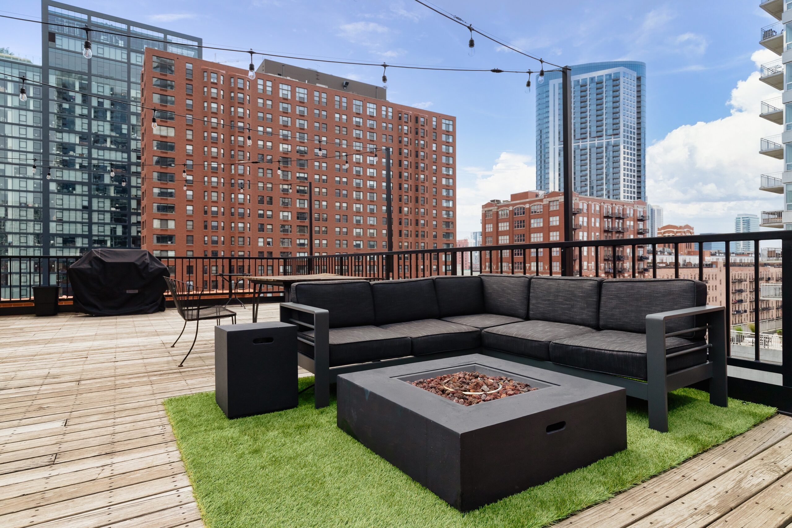 Rooftop Living Room With Turf Fire Pit