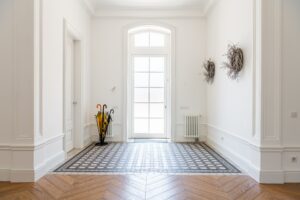 tiled foyer with wood floors