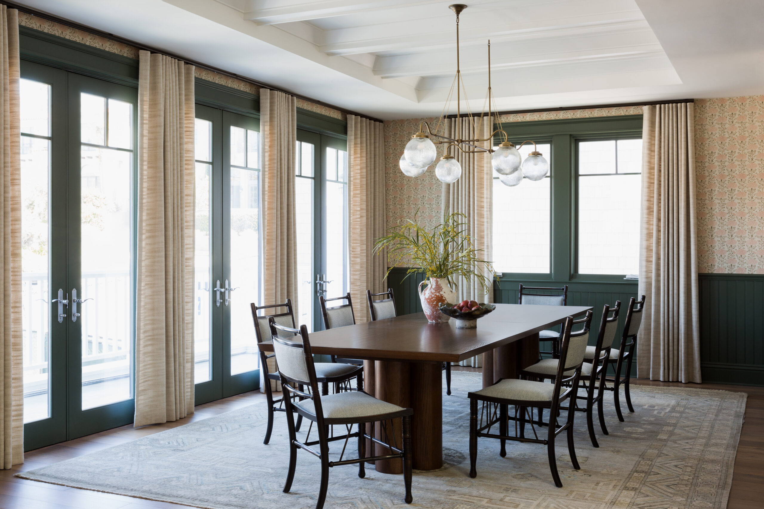 formal dining room with giant rug