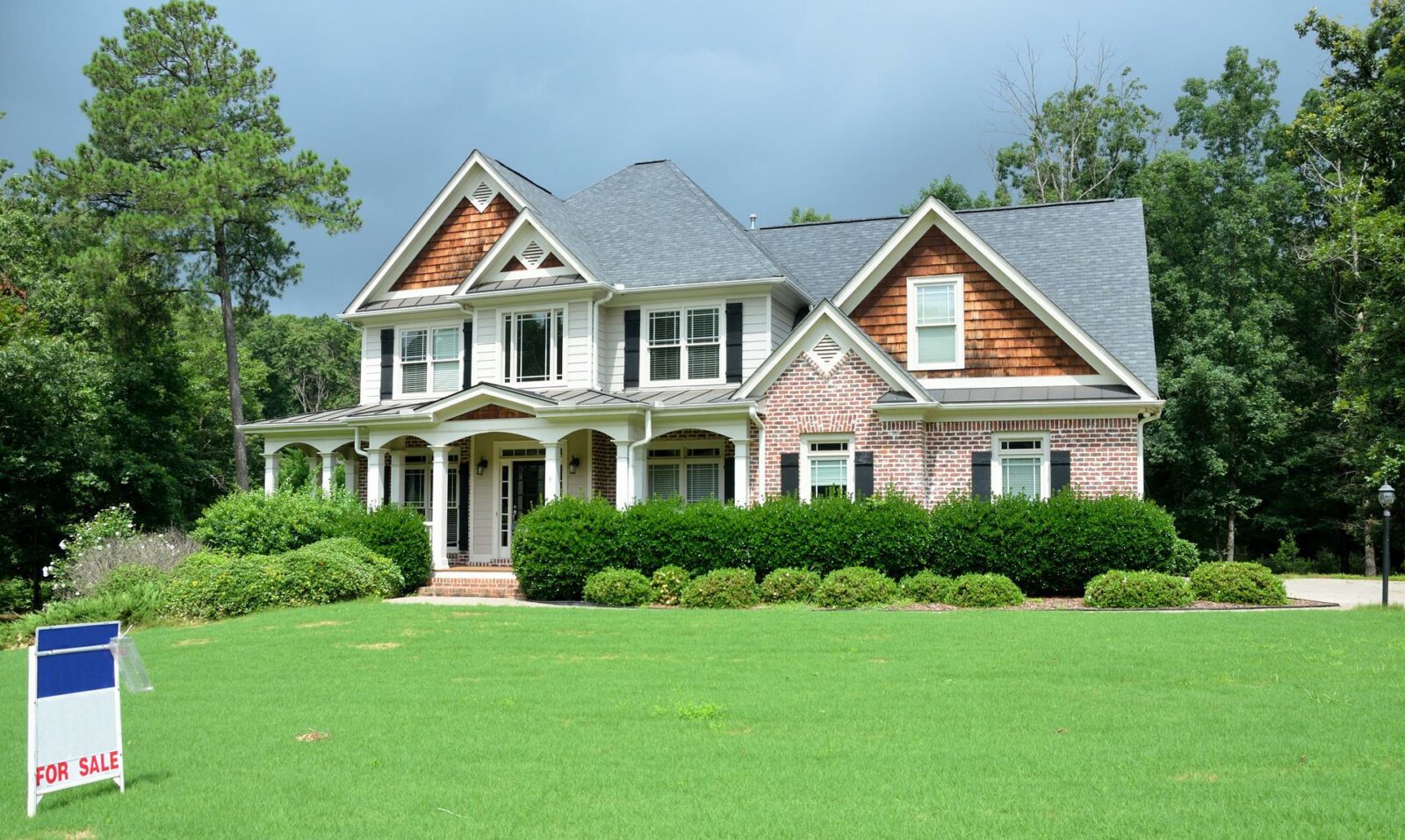 Traditional Style Home Fronted By For Sale Sign