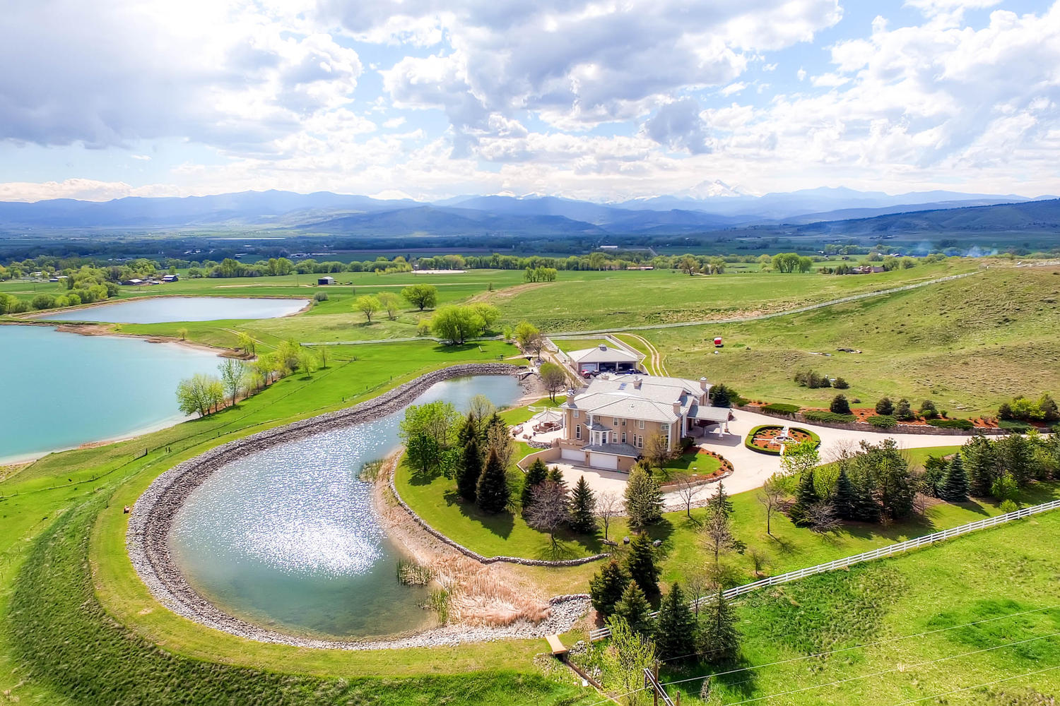 A Colorado estate surrounded by healthy greenery.