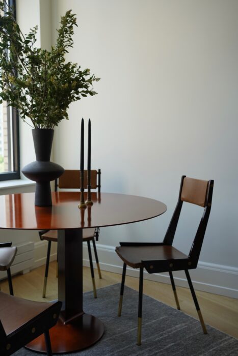interior view of a table with chairs in a clean modern design. 