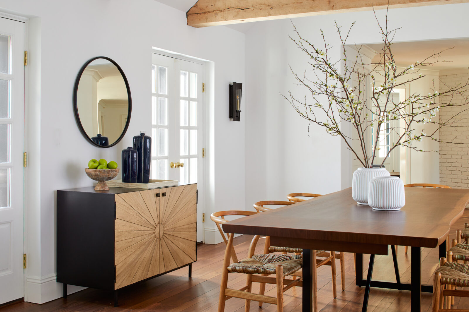 Interior view of a dining room with clean lines and classic elements.