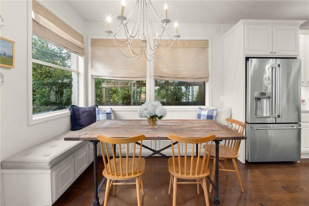 interior view of a kitchen nook with an elegant pearl chandelier