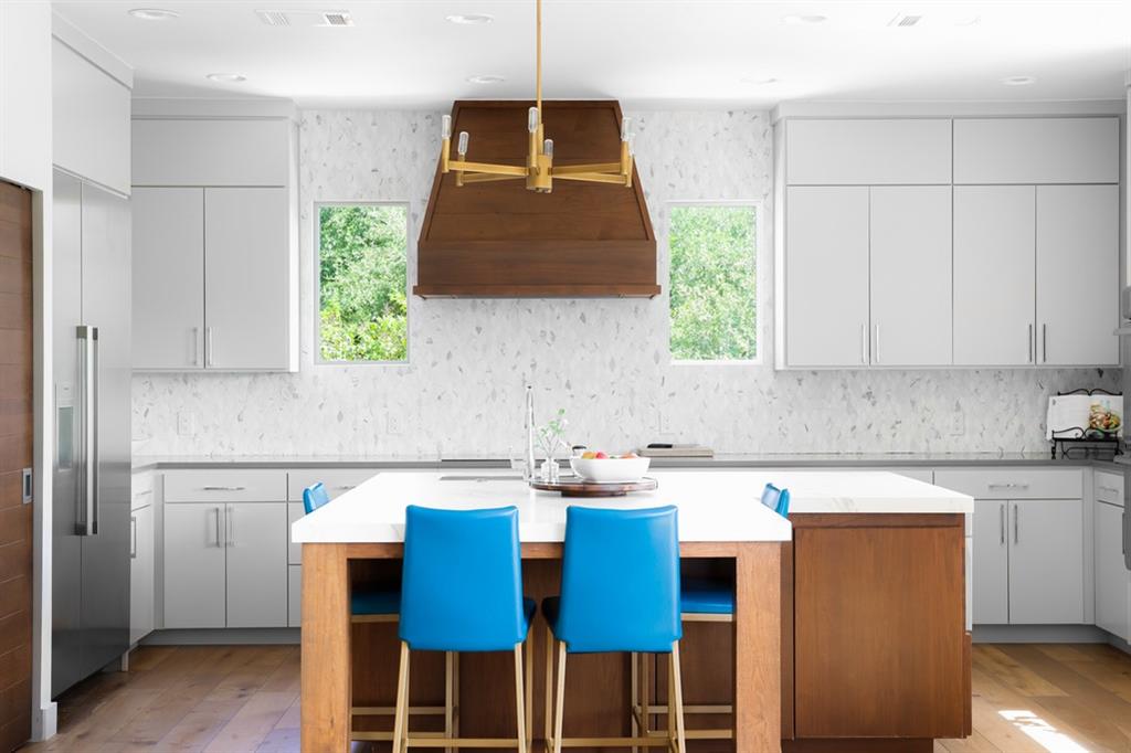 Interior view of a kitchen with a variety of countertop materials