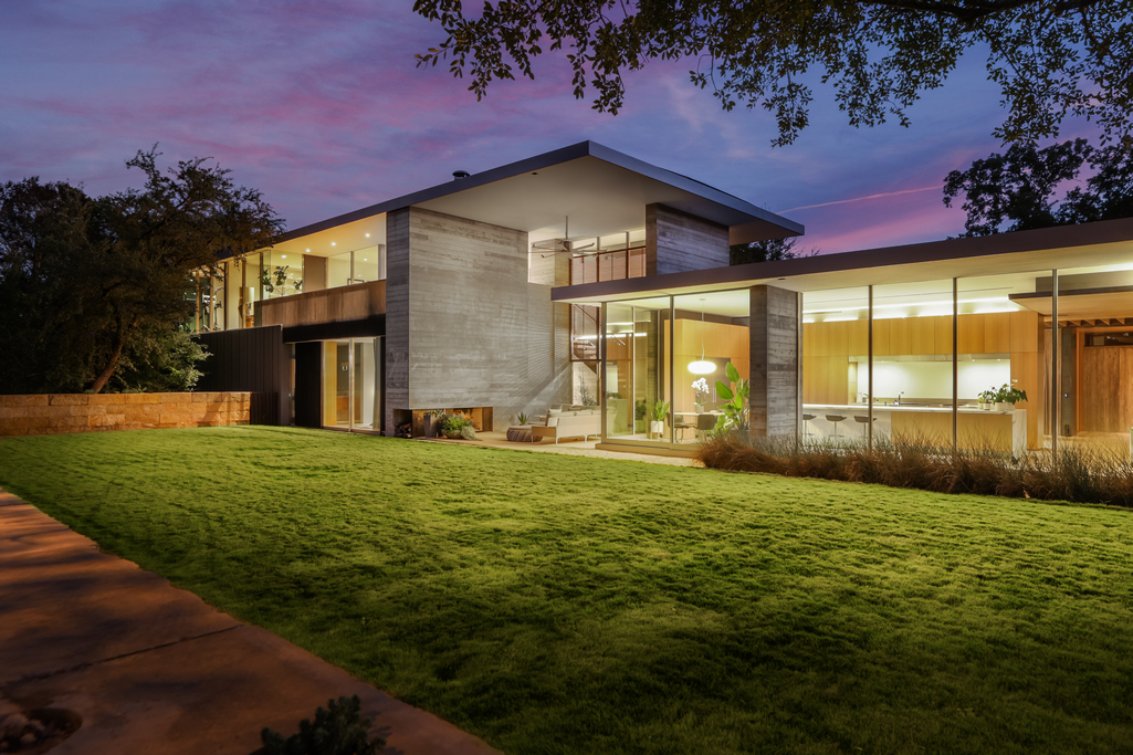 Exterior Night Photo Of Architectural Home Located At 2508 N. Cuernavaca Drive, Austin, TX