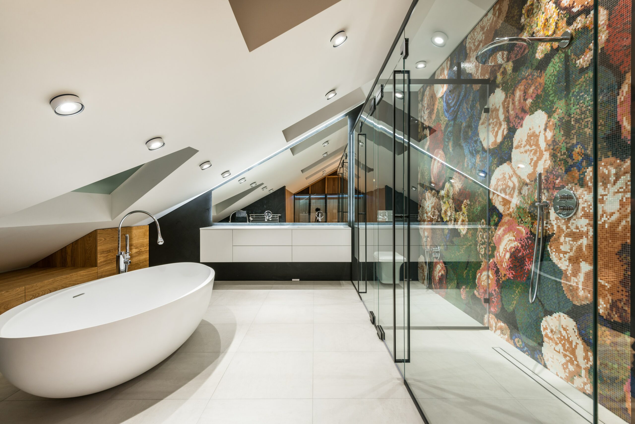 glass enclosed bathroom with art wall