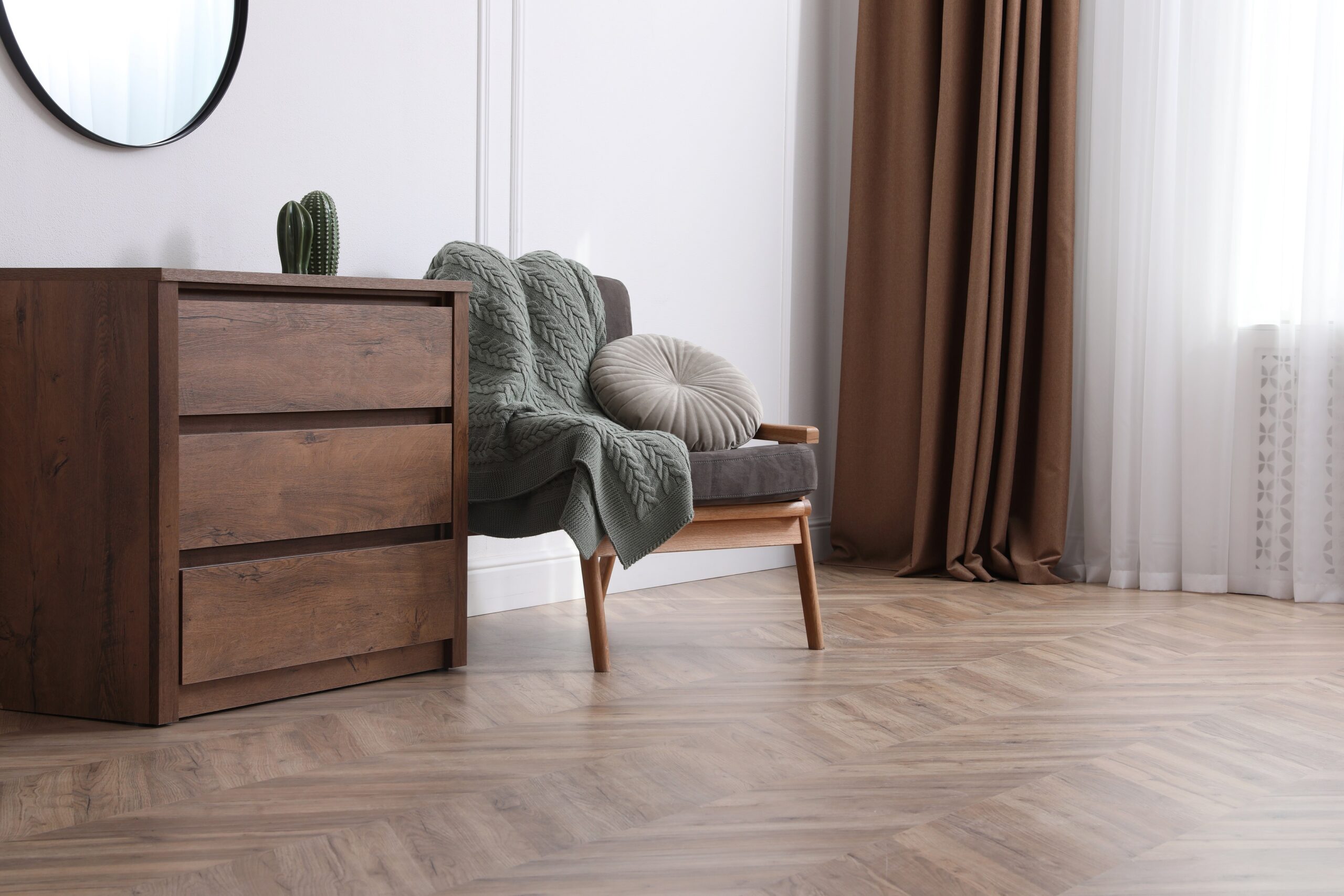 Contemporary Living Room With Herringbone Pattern Wood Floors