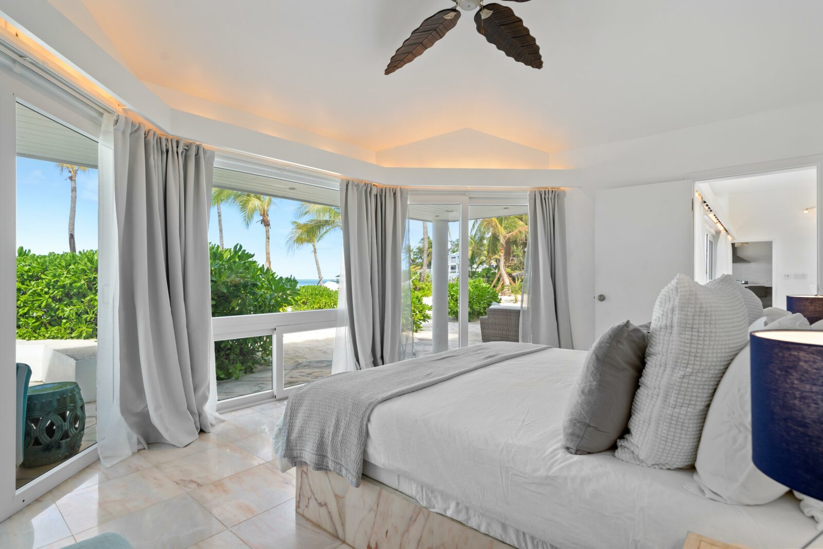 Primary bedroom inside a beachfront home in The Bahamas