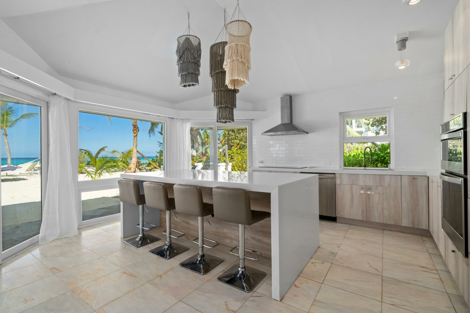 Renovated modern kitchen inside a beachfront home in The Bahamas