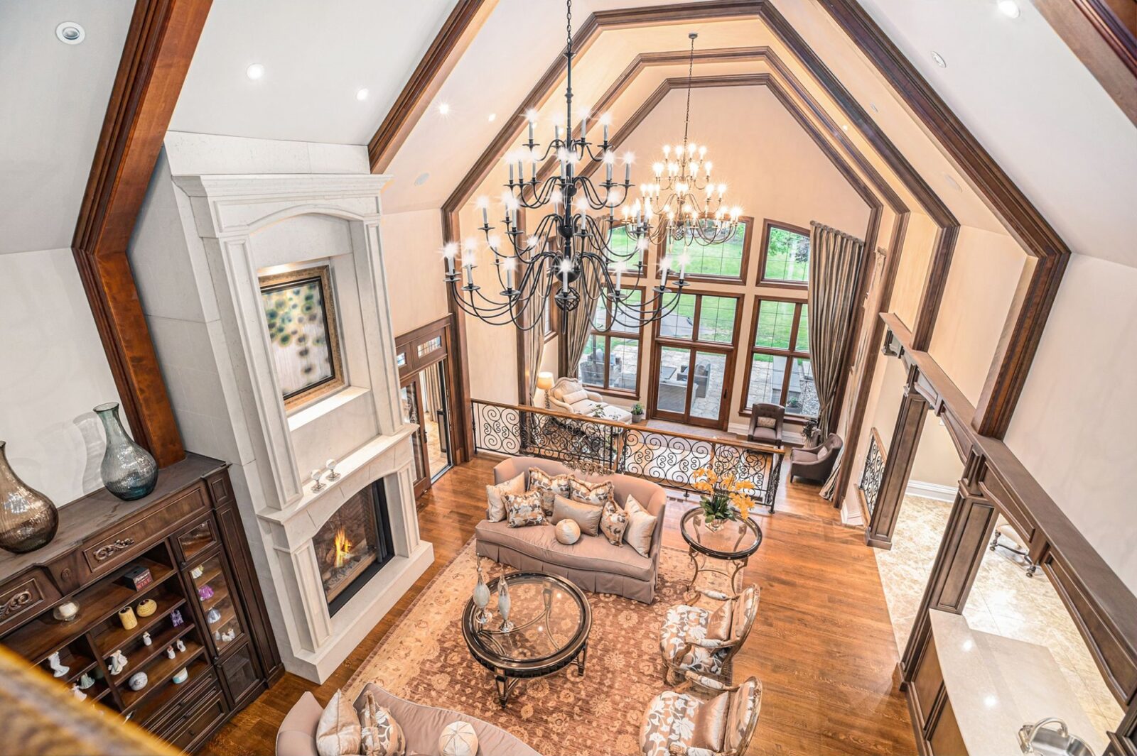 Two Story Living Room With Vaulted Ceiling