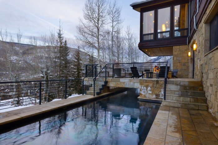 Outdoor swimming pool with views of Gore Range. 