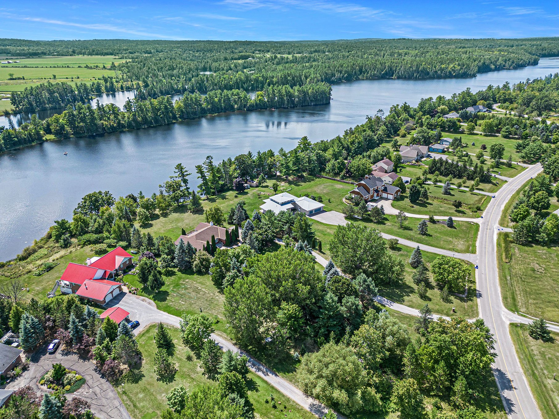 A lovely green neighborhood right by a river in Ottowa.