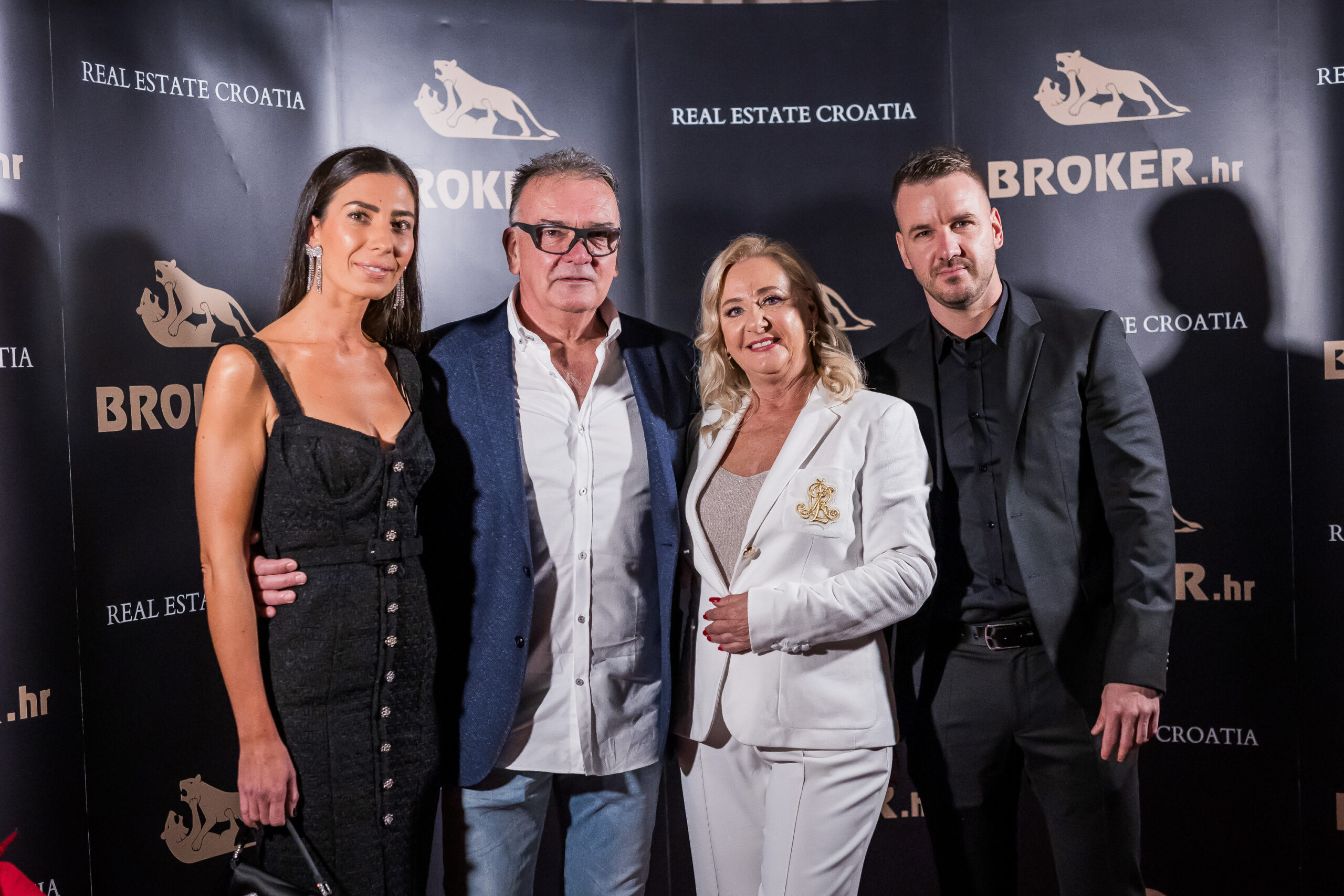 Dino Vulić (right) stands with his wife, Andrea (left), and his parents Ivica (center right) and Meri Vulić (center left).