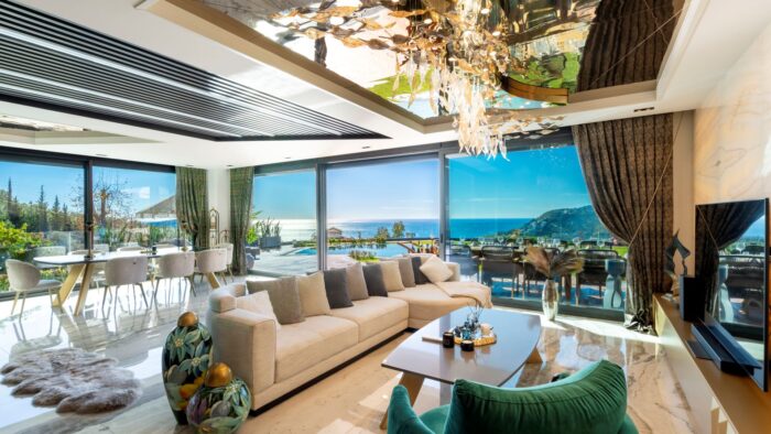 Sliding glass doors in main living area with ocean views. 