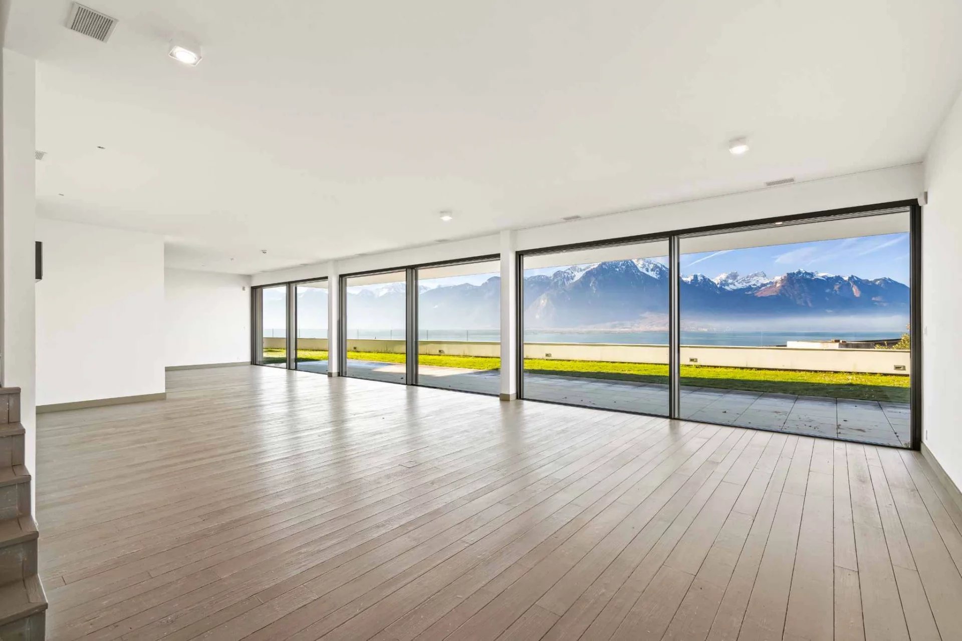 Mountain view from contemporary apartment on Lake Geneva. 