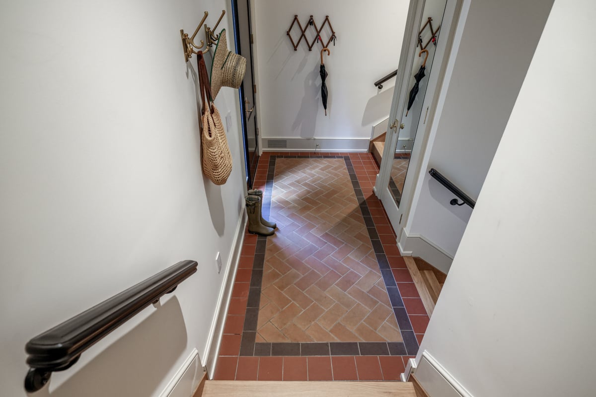 Reclaimed tiles laid on a landing inside a new-build Toronto house.