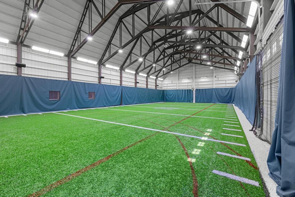 Indoor football training facility at Oregon home. 