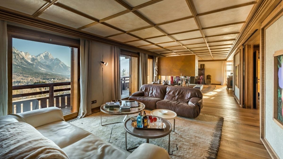 Perched above the valley of the Dolomites, the stylish, seven-bedroom villa spans five stories.