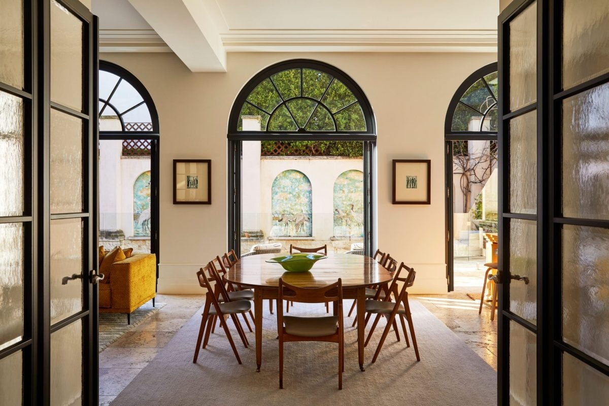 Toorak may have a reputation for grand old mansions, but peak beyond their walls and you'll often find these classic homes have some fashionable tricks up their sleeves. (Private Property Global)